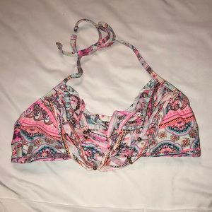 I am selling a multi color bathing suit top.